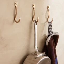 3 Ganchos Curvature, latón