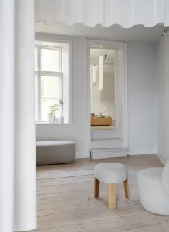 Banco Kuon, Boucla beige