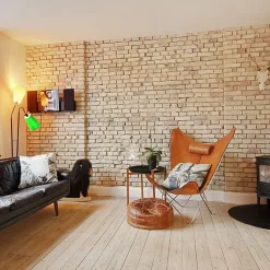 Butaca KS Chair, cuero avellana, estructura de acero inoxidable