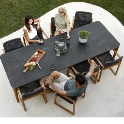 Silla con reposabrazos Endless, Dark grey, teakstativ