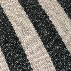 Sillón Rico lounge chair, Louisiana sand black