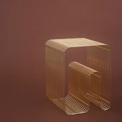 Taburete Curva, latón